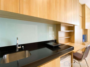 Modern Design and Homey Studio Ciputra World 2 Apartment By Travelio